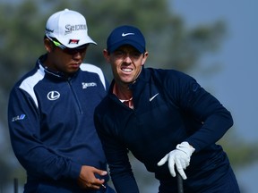 Rory McIlroy reacts to his tee shot on the second hole during the third round of the Farmers Insurance Open at Torrey Pines on Saturday. (Donald Miralle/Getty Images)