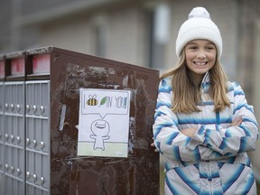 Lillian Parsons, 11, posted encouraging posters around her neigbourhood in East Windsor to lift people's spirits while the COVID-19 pandemic continues, Tuesday, March 24, 2020.