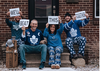 A family of Toronto Maple Leaf fans pose for a self-isolation portrait by Windsor photographer Jessica Tanchioni.