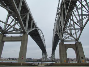 The twin spans of the Blue Water Bridge, near Sarnia, cross the St. Clair River to Port Huron, Mich.