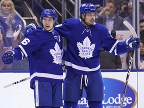 Toronto Maple Leafs forwards Mitch Marner (left) and Auston Matthews (right) celebrates a goal against the Winnipeg Jets on Jan. 8, 2020, at Scotiabank Arena in Toronto. (JOHN E. SOKOLOWSKI/USA TODAY Sports)