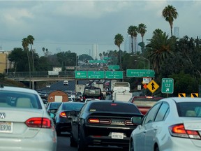 FILE PHOTO: Morning traffic makes its way along a Los Angeles freeway in Los Angeles, California, U.S., September 19, 2019.