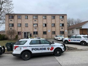 Windsor police units secure the crime scene at 591 Wellington Ave. on March 10, 2020. Two men have been charged with aggravated assault.