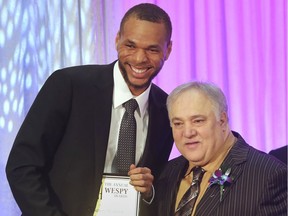 WINDSOR, ON. MARCH 10, 2020 -  Canadian Olympian Brandon McBride, left, poses with Domenic Papa, founder of the WESPY Awards during the 15th annual edition on Tuesday, March 10, 2020 at the Caboto Club in Windsor, ON. McBride, from Windsor, is a former WESPY award winner and current Canadian Olympic track athlete who was recognized during the event.