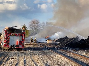 Crews from Chatham-Kent Fire & Emergency Services responded to a rail ties fire behind Colborne Street in Chatham on April 14. (Handout/Postmedia Network)