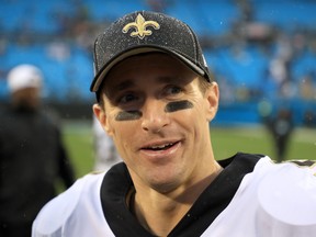 Drew Brees of the New Orleans Saints watches on after defeating the Carolina Panthers 42-10m at Bank of America Stadium on December 29, 2019 in Charlotte, North Carolina. (Streeter Lecka/Getty Images)