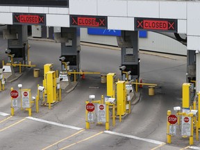 A view of empty Detroit-Windsor Tunnel custom lanes that connects Detroit and Windsor.