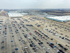 A depleting supply of new Chrysler vehicles sit on a lot outside of the Fiat Chrysler Automobiles (FCA) Belvidere Assembly Plant on March 24, 2020 in Belvidere, Illinois. In response to the COVID-19 pandemic FCA announced last week that it would cease production at it's North America plants. The company hopes to resume operation next week after implementing changes agreed with the UAW including shift timings, structures and enhanced cleaning protocols.