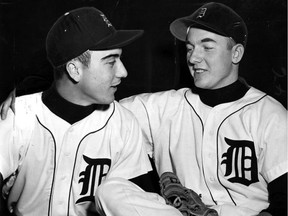 Reno Bertoia, left, chats with fellow Detroit Tiger player Al Kaline in this April 18, 1956, file photo.
