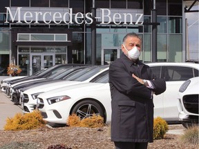 Auto dealers have had to try new things to sell vehicles during the COVID-19 pandemic. Shown here on April 9, 2020, is well-known local businessman Terry Rafih outside the Mercedes Benz dealership at his sprawling Tecumseh Road East automobile dealership complex.