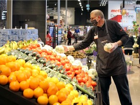 Windsor, Ontario. April 20, 2020.   Tim Hagman works in the produce department of Metro's Devonshire Mall store.  Local businesses are hiring up to 400 workers. See Cross story. Monday.