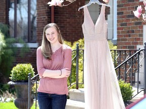 Disappointed but understanding. Brennan high school student Mira Gillis is shown on April 27, 2020, with her prom dress purchased months before COVID-19 triggered a global pandemic. The novel coronavirus has closed down schools and forced the cancellation of local proms.