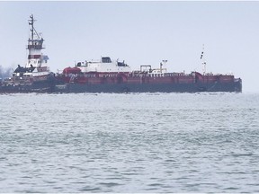 The barge Margaret is pictured on Wednesday in Lake St. Clair as efforts continued to free the grounded vessel.