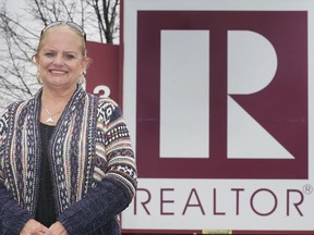Lorraine Clark, president of the Windsor Essex County Association of Realtors, talks Tuesday at the organization's office about the local housing market.