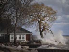 Waves crash against the shore along Point Pelee Drive, Monday, April 13, 2020, as a flood warning is in effect due to high winds and continually high lake levels.