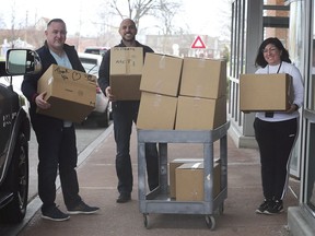 Local health workers "need to be supported." IBEW Local 773 CEO Karl Lovett, left, and Mezzo Ristorante co-owner Filip Rocca drop off food for staff at Windsor Regional Hospital's Met campus on Friday, April 10, 2020. Helping unload the donated meals was Cristina Naccarato, the hospital's manager of philanthropy.
