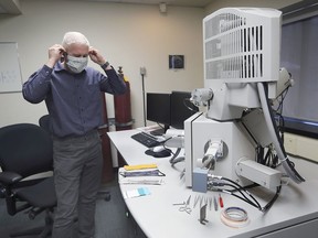 Ken Drouillard, a professor at the University of Windsor is shown at the Great Lakes Institute for Environmental Research facility on April 23, 2020. He is pictured next to an environmental electron microscope that will be used to characterize the fabric types used in the masks.