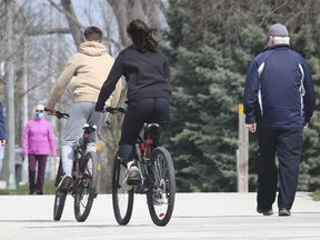WINDSOR, ON. APRIL 24, 2020 -  Walkers and cyclists are shown on the Ganatchio Trail in Windsor, ON. on Friday, April 24, 2020.
