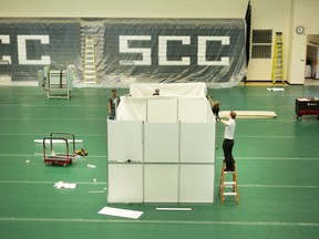 Crews prepare the St. Clair College SportsPlex for a field hospital for Windsor Regional Hospital in the event of a COVID-19 surge, Friday, April 3, 2020.