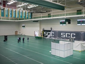 Crews prepare the St. Clair College SportsPlex for a field hospital for Windsor Regional Hospital in the event of a COVID-19 surge, Friday, April 3, 2020.