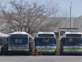 Buses are seen parked at Transit Windsor, Monday, April 27, 2020.  Buses are to resume limited service starting May 4.