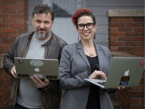 University of Windsor professors, Dave Cormier, left, and Bonnie Stewart, pictured outside their home, Wednesday, April 15, 2020, are offering webinars in how to teach online.