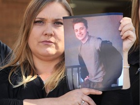 Carolyn Crankshaw is shown on Sept. 24, 2019, holding a photo of her deceased son, Darrion Moffatt, prior to a Windsor night vigil for local victims of violence.