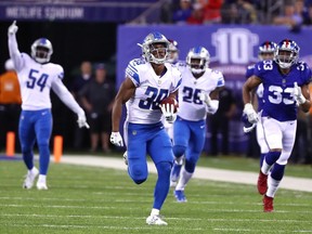 Jamal Agnew of the Detroit Lions returns an 88 yard punt return for a touchdown in the fourth quarter against the New York Giants during their game at MetLife Stadium on September 18, 2017 in East Rutherford, New Jersey.