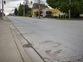 The scene of an accident where a cyclist was struck by a motor vehicle at the intersection of Walker Road and Richmond Street, Sunday, May 17, 2020.  The incident occurred the previous evening and the cyclist remains in serious condition.