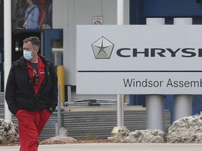 A security guard is shown at the idled FCA Windsor Assembly Plant on Friday, May 8, 2020. Efforts are underway to resume production at the plant.