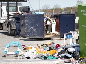 The City of Windsor has hired a crew of two workers to clear away illegal dumping on Provincial Road Wednesday.  The men filled two industrial disposal bins with debris, clothing, old furniture and garbage that created an eyesore on the 1800 block of Provincial Road, not far from the entrance to Lowe's and Monarch Basics.