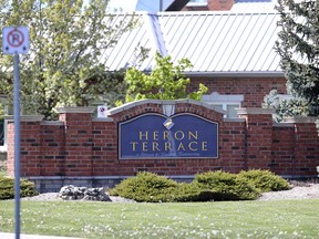 The sign at Heron Terrace Long-Term Care Community at 11550 McNorton St. in Tecumseh on May 13, 2020.