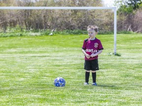 The COVID-19 pandemic has doomed the summer soccer season for children like four-year-old Derrick Kirk who plays with the East London Soccer Club in London, Ontario. (Derek Ruttan/The London Free Press)