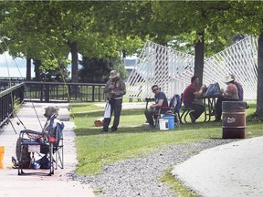 Park-goers in Windsor along the riverfront near the Ambassador Bridge on May 25, 2020.
