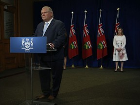 Ontario Premier Doug Ford speaks at his daily briefing about mask usage and PPE at Queen's Park in Toronto, Ont.  at Queen's Park on Wednesday May 20, 2020.