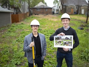 Nate Schaly, left, and Clarke Gallie, who are building a tiny home in the back lot of 773 Assumption St., are pictured Thursday, May 14, 2020.