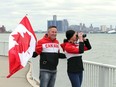 Lori and Kevin Corriveau revisit Windsor's Reaume Park Monday. On Saturday, the Corriveau's brought attention from U.S. Coast Guard after they were seen waving their hands in the air on the shoreline, trying to communicate with their daughter and granddaughter across the Detroit River in Michigan.