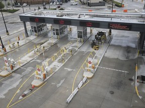 Closed inspection booths at the Windsor/Detroit tunnel exit in Windsor are shown on Tuesday, May 19, 2020.