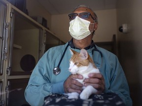 Dr. Manjit Jammu, a veterinarian, is pictured at LaSalle Animal Hospital, Wednesday, May 6, 2020.