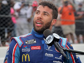Bubba Wallace, driver of the #43 Victory Junction Chevrolet, speaks to the media after the NASCAR Cup Series GEICO 500 at Talladega Superspeedway on June 22, 2020 in Talladega, Alabama.