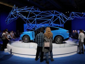 FILE PHOTO: A 2021 Ford Mustang Mach-E SUV electric vehicle is displayed at the Canadian International Auto Show in Toronto, Ontario, Canada February 18, 2020.