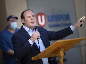 MP Chris Lewis (C—Essex) speaks about issues surrounding the Employment Insurance system in the wake of COVID-19 on Friday outside Unifor offices on Somme Avenue in Windsor.