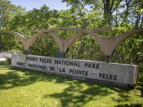 A sign at the entrance to Point Pelee National Park is pictured Thursday, June 11, 2020..
