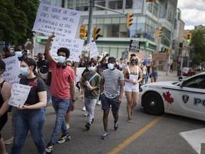WINDSOR, ONT:. JUNE 6, 2020 -- Hundreds marched throughout downtown Windsor Saturday, June 7, 2020, for Regis Korchinski-Paquet, as protests continue for police reform in the wake of the killing of George Floyd.