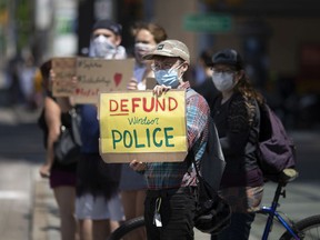 As in American cities, some local voices, in the wake of George Floyd's killing, are calling for the Windsor Police Service to also be "defunded," and more local tax spending be put towards other municipal priorities. Protesters are shown here on June 6, 2020, on the first of two days of mass rallies in downtown Windsor calling out racism.