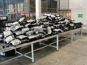 Packages of marijuana seized June 19 by U.S. Customs and Border Protection in Detroit. The bags were hidden in a municipal garbage hauler.