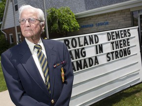 Roland Demers, 97, a Second World War veteran, stands outside the Royal Canadian Legion Branch 255, where his name is posted as a rotating honouring of veterans during the legion's closure due to COVID-19, Friday, June 5, 2020.