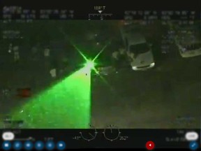 An image taken by a U.S. federal helicopter showing the aircraft being targeted by someone with a green laser on the downtown Windsor riverfront on the night of June 3, 2020.