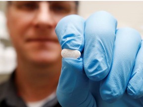 The drug hydroxychloroquine, pushed by U.S. President Donald Trump and others in recent months as a possible treatment to people infected with the coronavirus disease (COVID-19), is displayed by a pharmacist at the Rock Canyon Pharmacy in Provo, Utah, U.S., May 27, 2020.