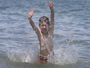 WINDSOR, ON. JUNE 9, 2020 -  A youngster cools down at the Sandpoint Beach in Windsor, ON. on Tuesday, June 9, 2020.